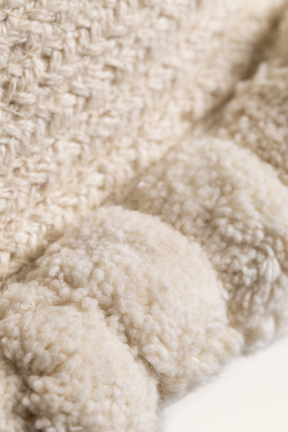 Cuscino rotondo in cotone intrecciato Olets