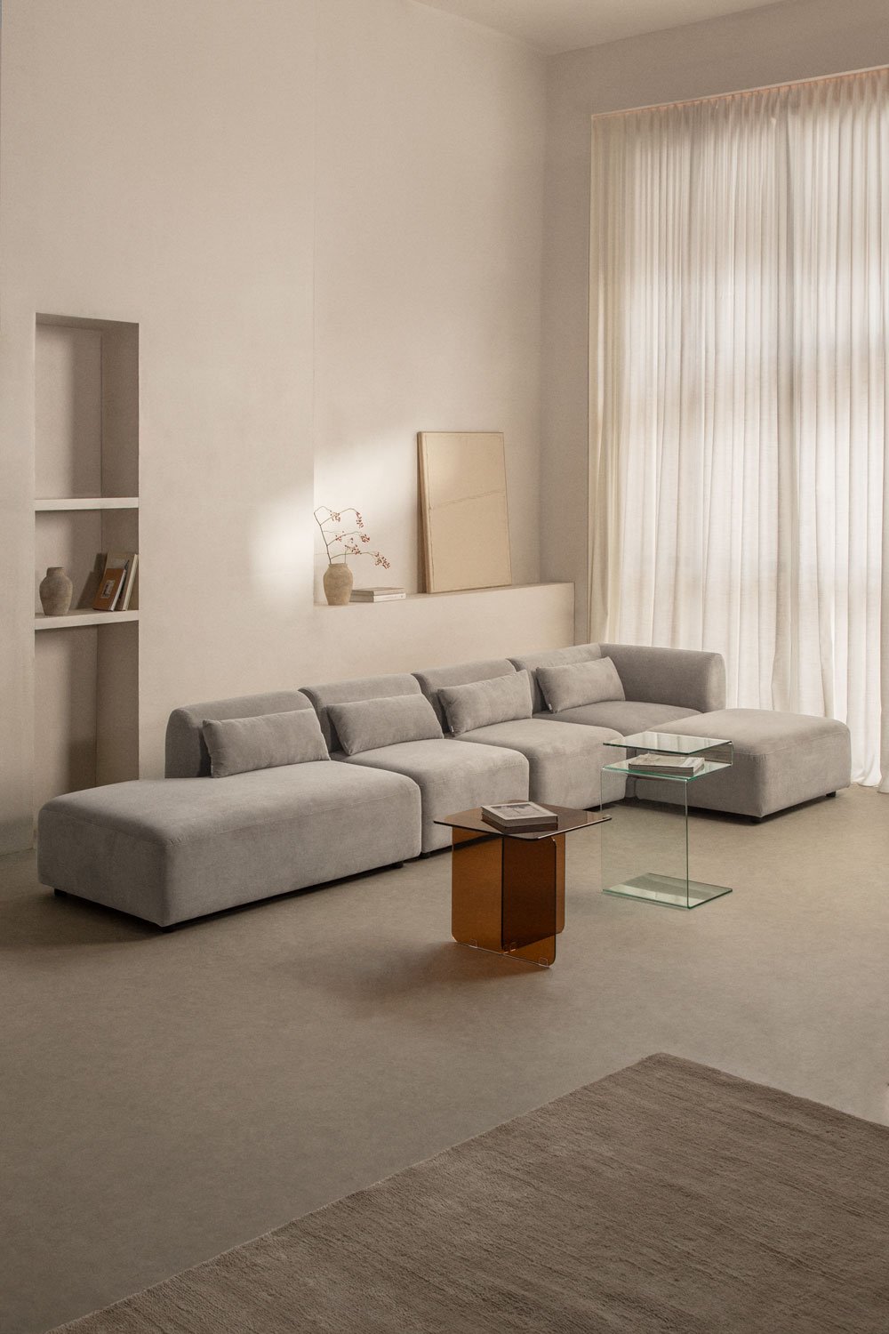 Divano angolare componibile in 4 pezzi con chaise longue sinistra e pouf Fogler