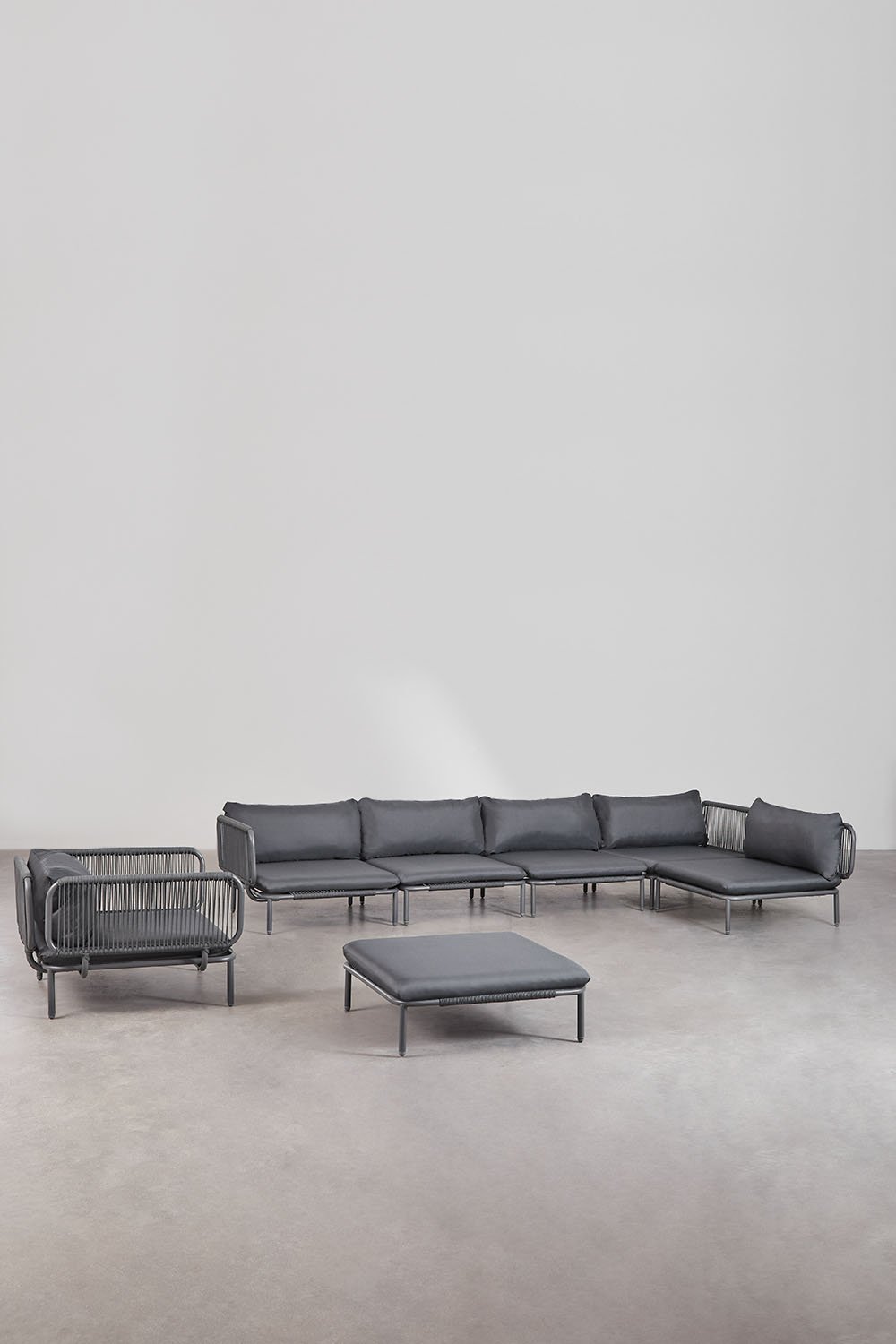 Divano angolare da giardino componibile in 5 pezzi con pouf e poltrona Roubly