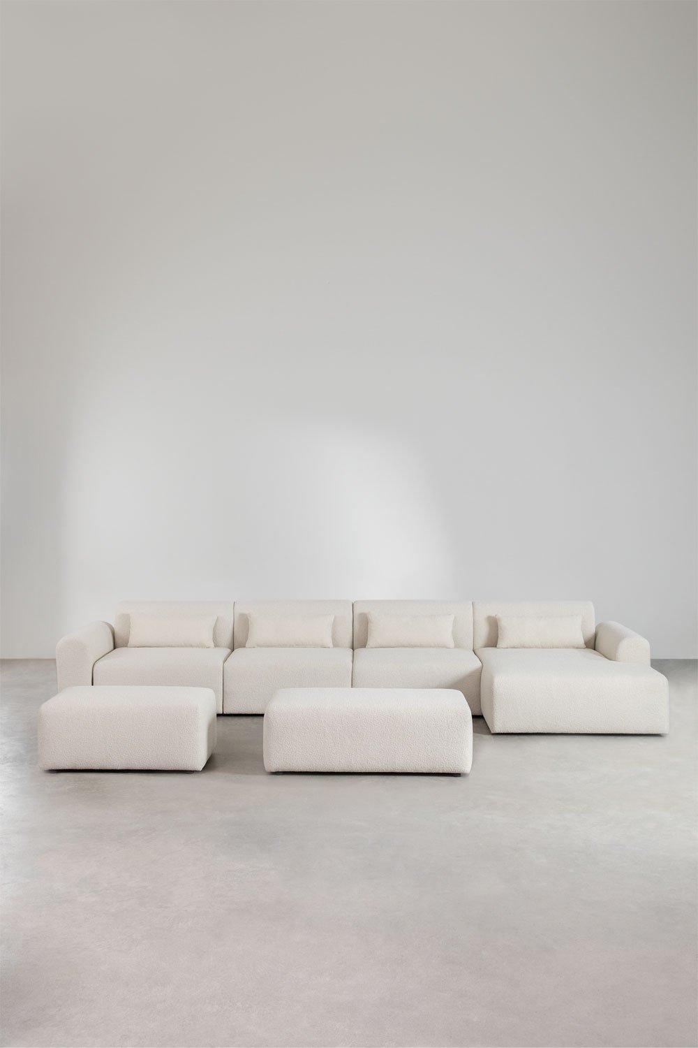 Sofà modulare con chaise longue destra di 4 pezzi 2 pouf in tessuto bouclé Borjan
