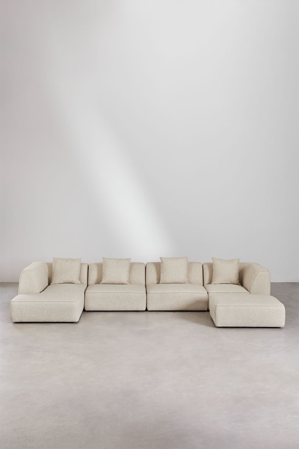 Divano modulare con chaise longue sinistra a 4 pezzi con pouf rivestito Cardea