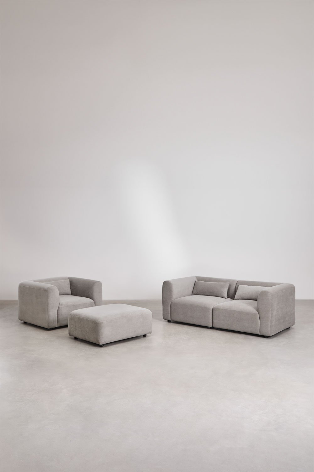 Set soggiorno con divano componibile in 2 pezzi, poltrona e pouf Fogler