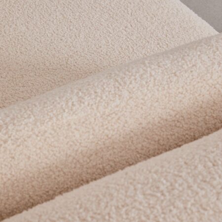 Divano componibile in 3 pezzi con chaise longue sinistra e pouf Fogler
