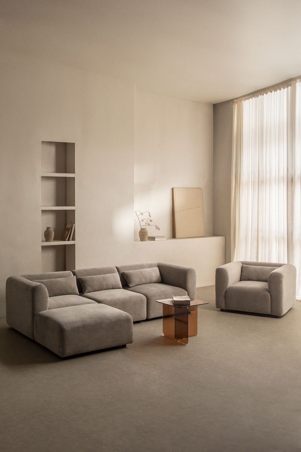 Set soggiorno con divano componibile in 3 pezzi, poltrona e pouf Fogler