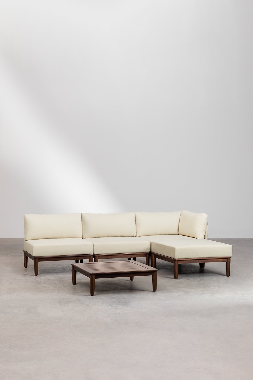 Set da giardino Giulia con divano angolare modulare da 3 pezzi, tavolino e pouf in legno di acacia.