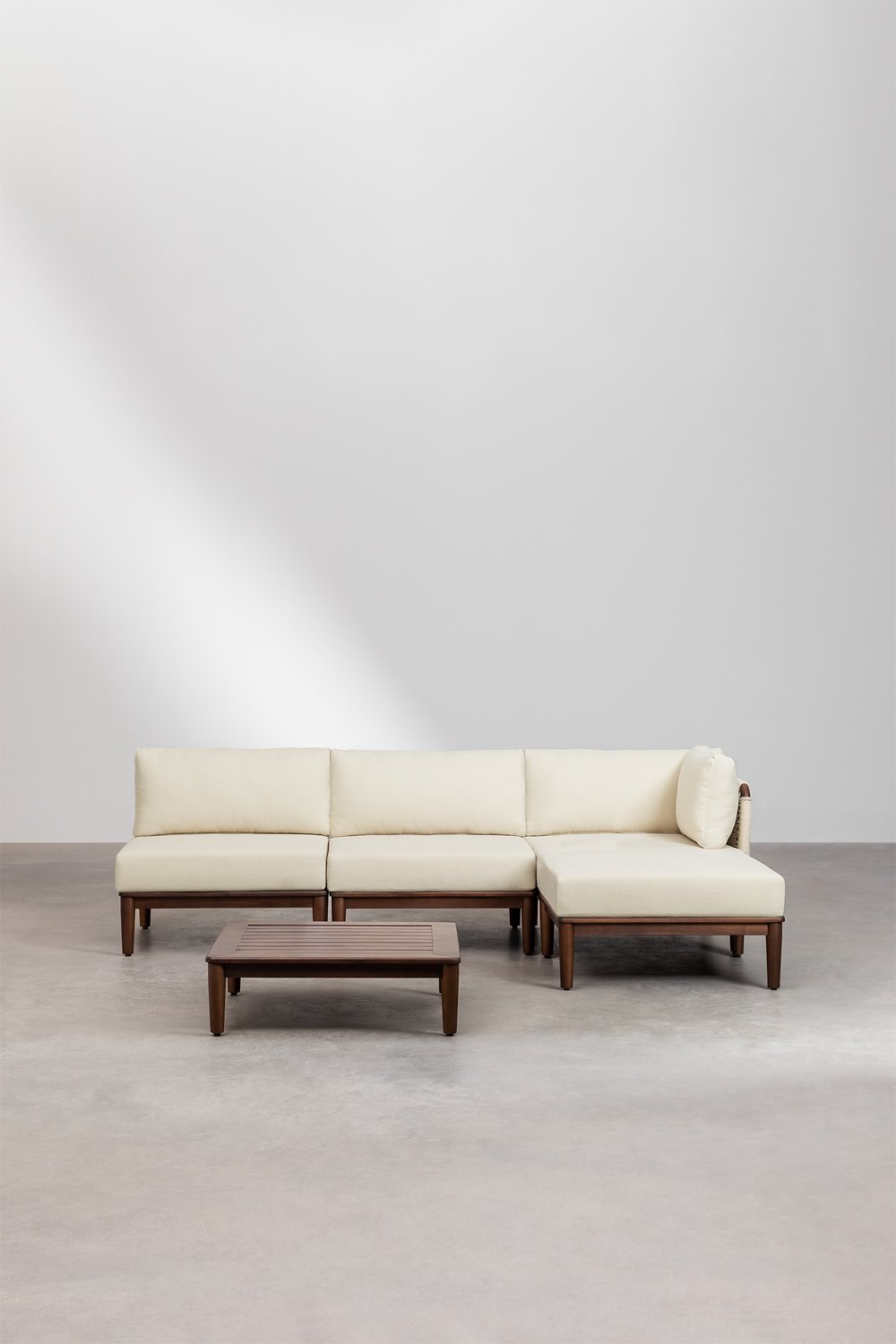 Set da giardino Giulia con divano angolare modulare da 3 pezzi, tavolino e pouf in legno di acacia.