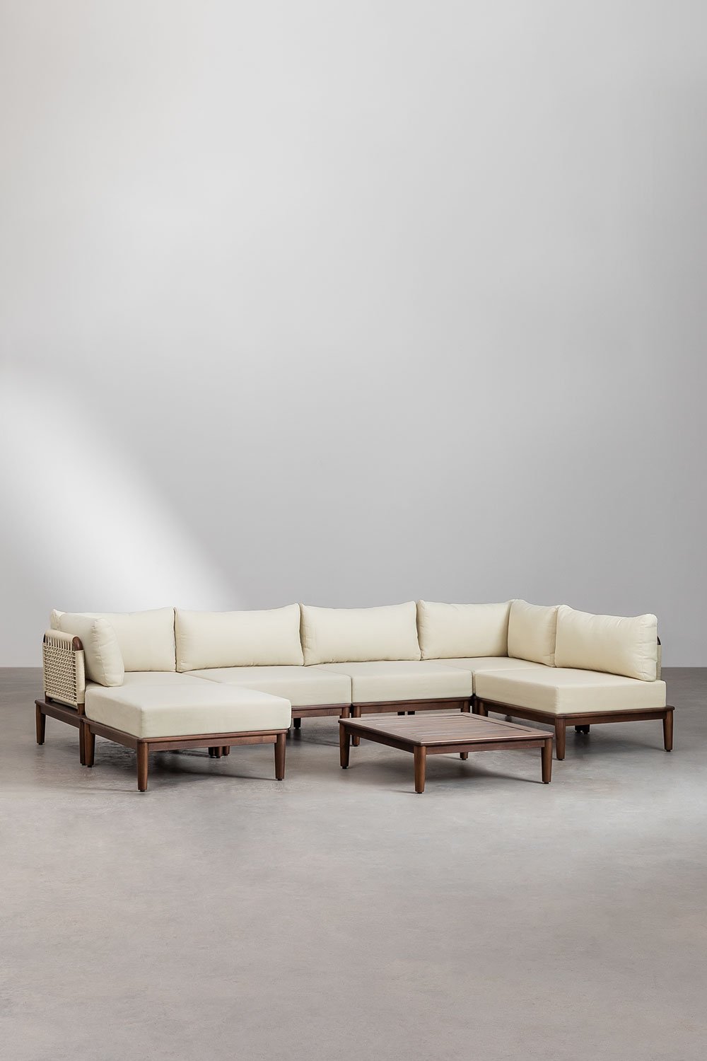 Set da giardino Giulia con divano angolare modulare da 5 pezzi, tavolino e pouf in legno di acacia.