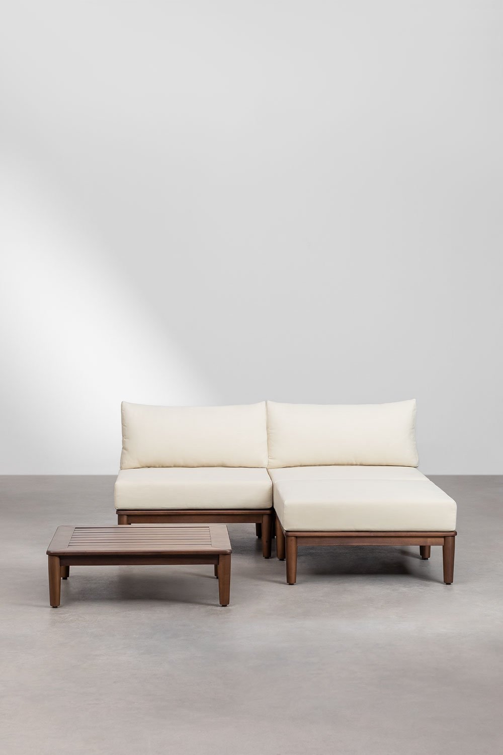 Set da giardino Giulia con divano modulare da 2 pezzi, tavolino e pouf in legno di acacia.