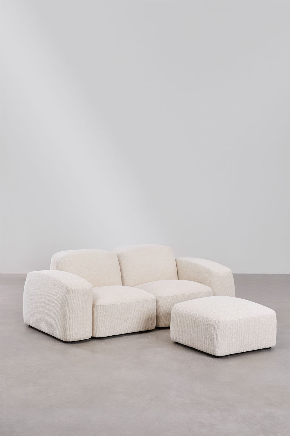Divano componibile Bastian 2 pezzi e pouf