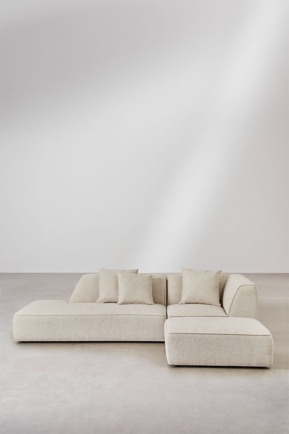 Divano modulare angolare a 2 pezzi con chaise longue sinistra e pouf rivestito Cardea
