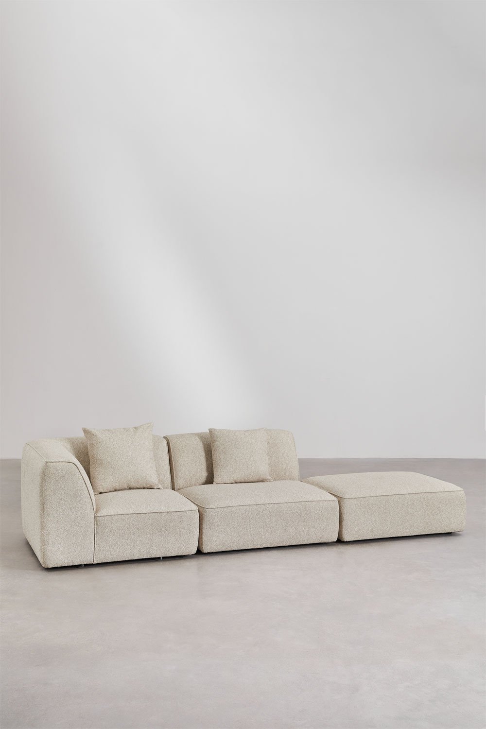Divano modulare angolare a 2 pezzi con pouf rivestito Cardea