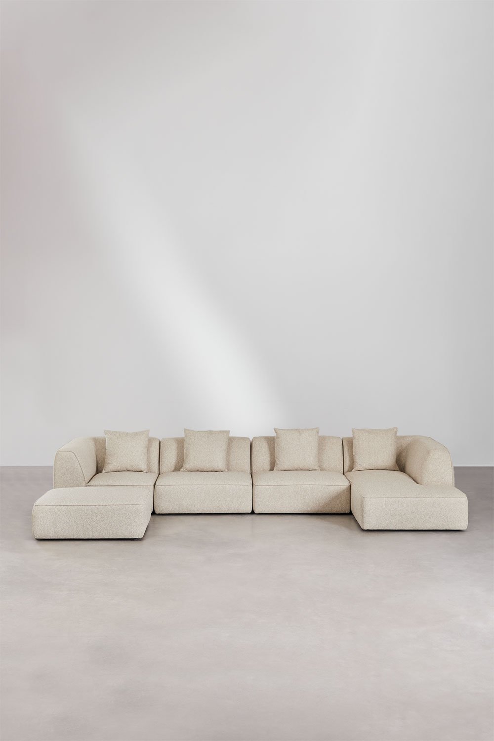 Divano modulare con chaise longue destra a 4 pezzi con pouf rivestito Cardea