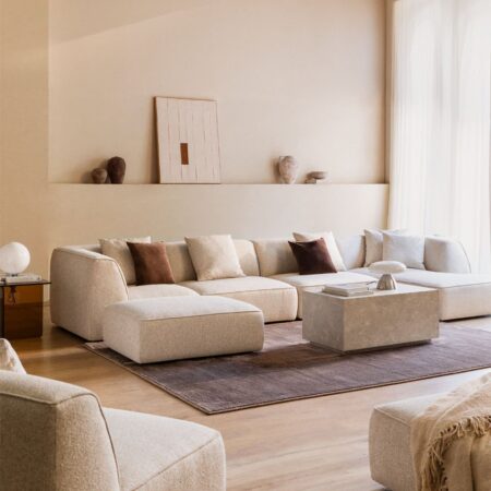 Divano modulare con chaise longue destra a 4 pezzi con pouf rivestito Cardea