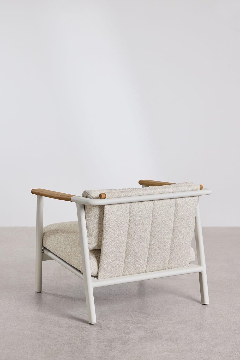 Poltrona Yervin in alluminio e tessuto bouclé