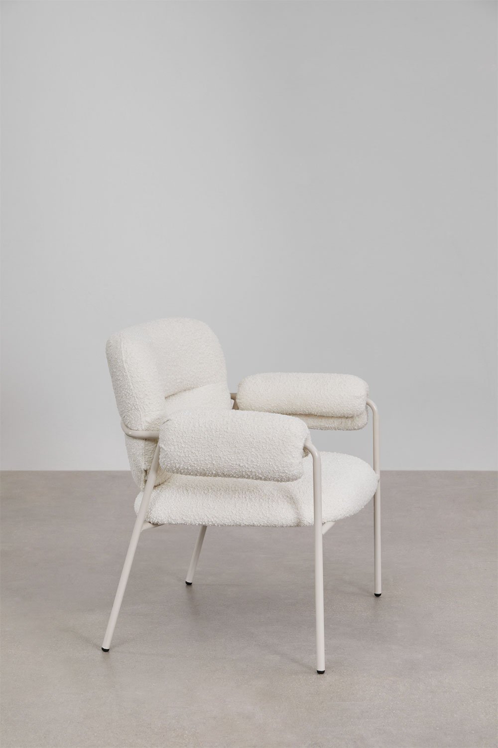 Poltrona in tessuto bouclé Hanko