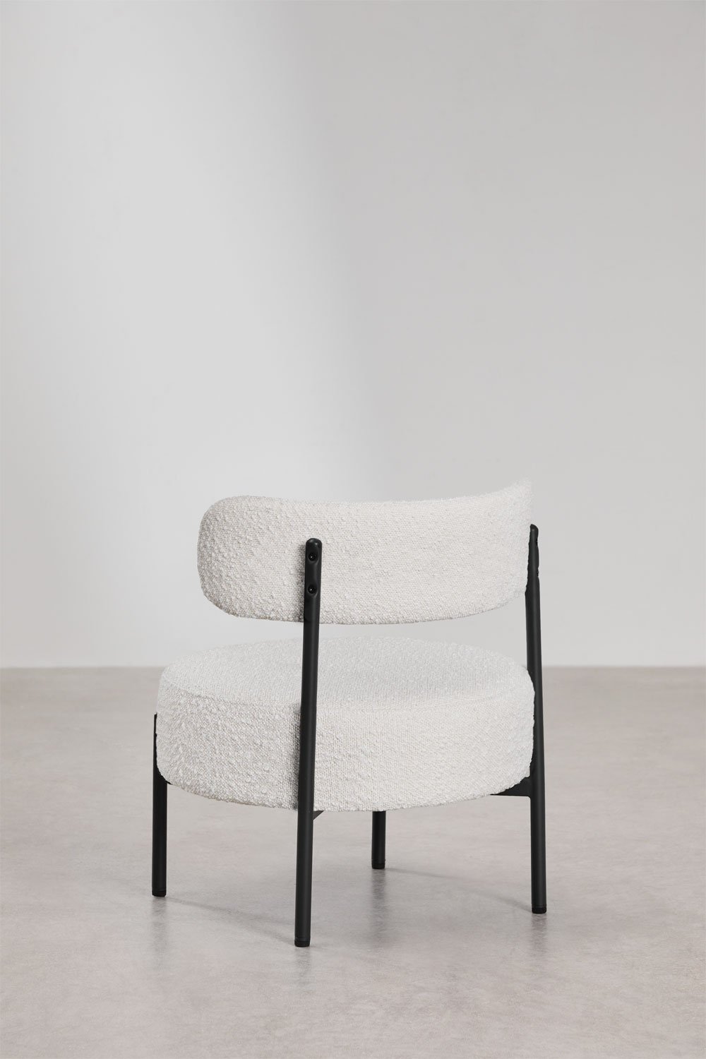 Poltrona in tessuto bouclé Anisa