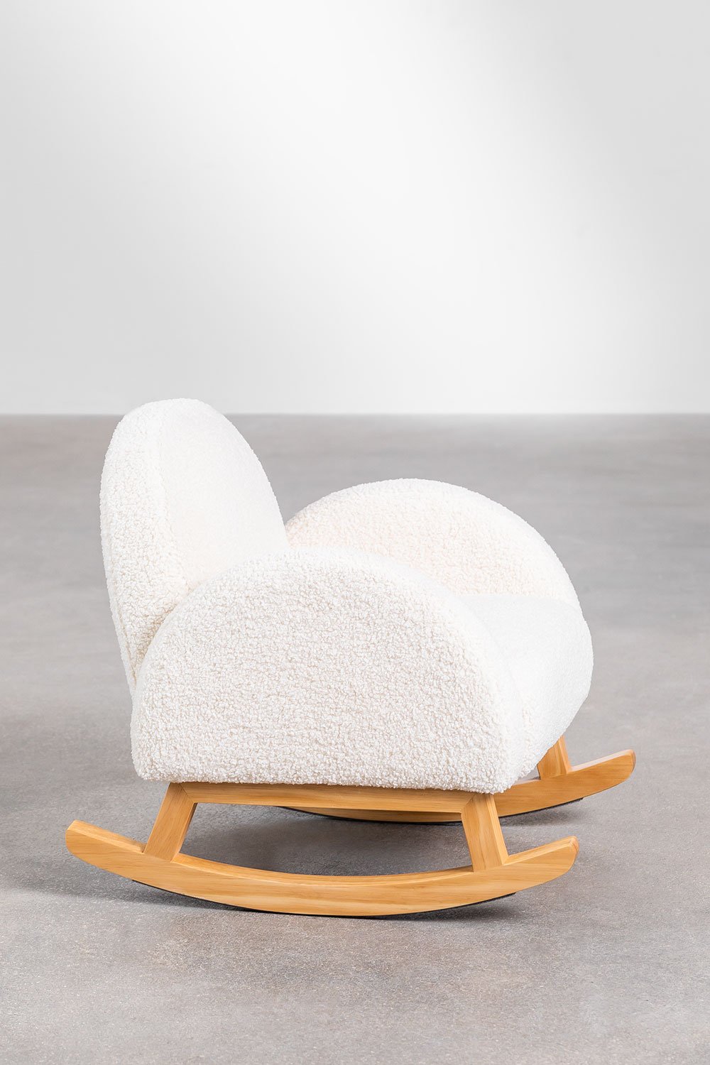 Sedia a dondolo in pelle di pecora Gigis Kids