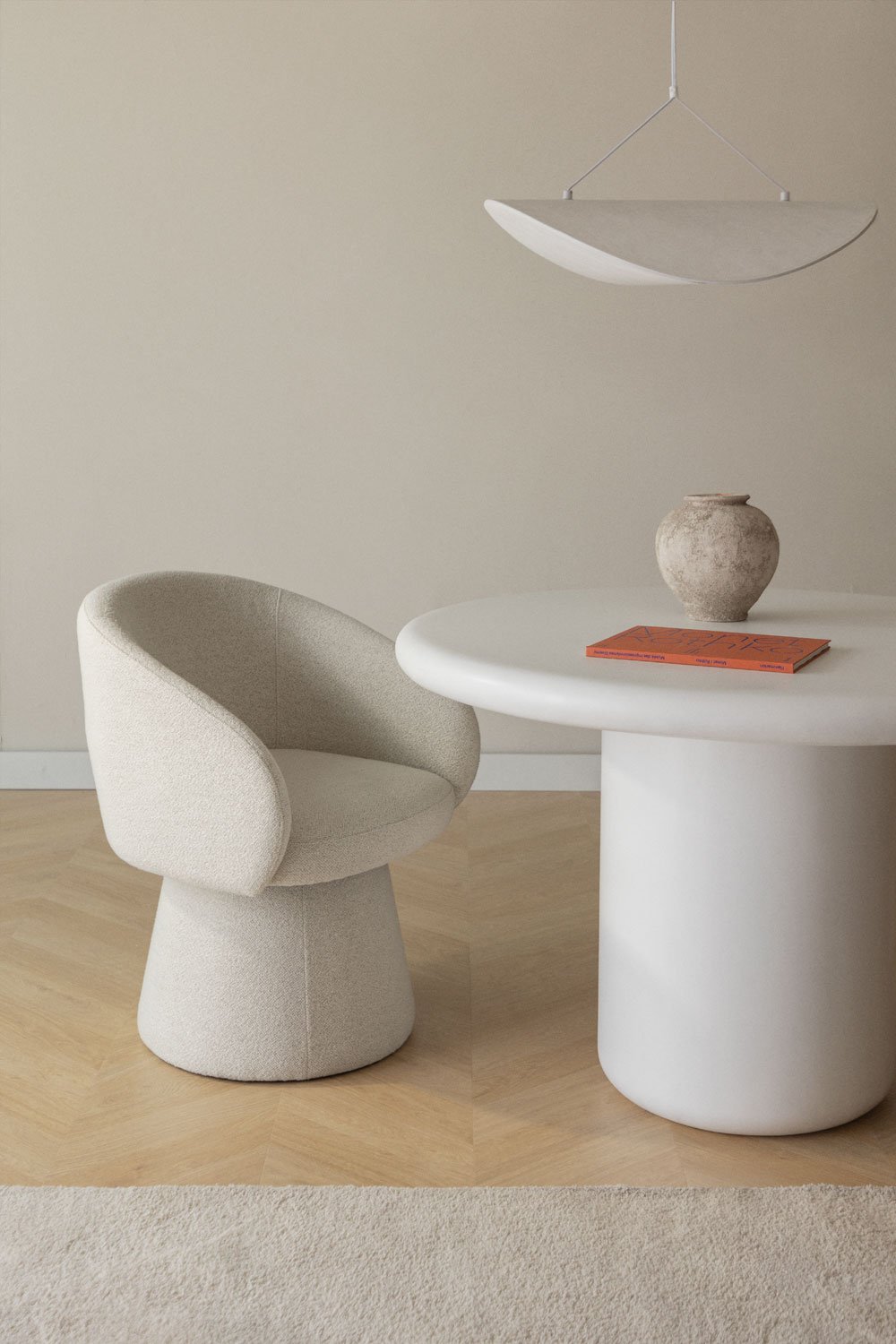 Sedia da pranzo girevole con braccioli in tessuto Flavian bouclé