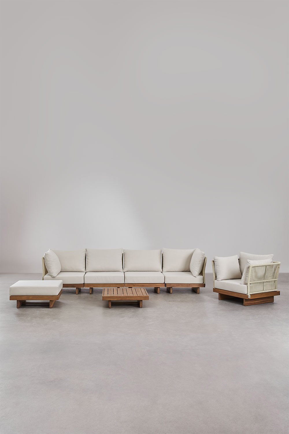Set di divani da giardino modulari Dailin da 4 pezzi con 2 sedie angolari, tavolino, poltrona e pouf in legno di acacia