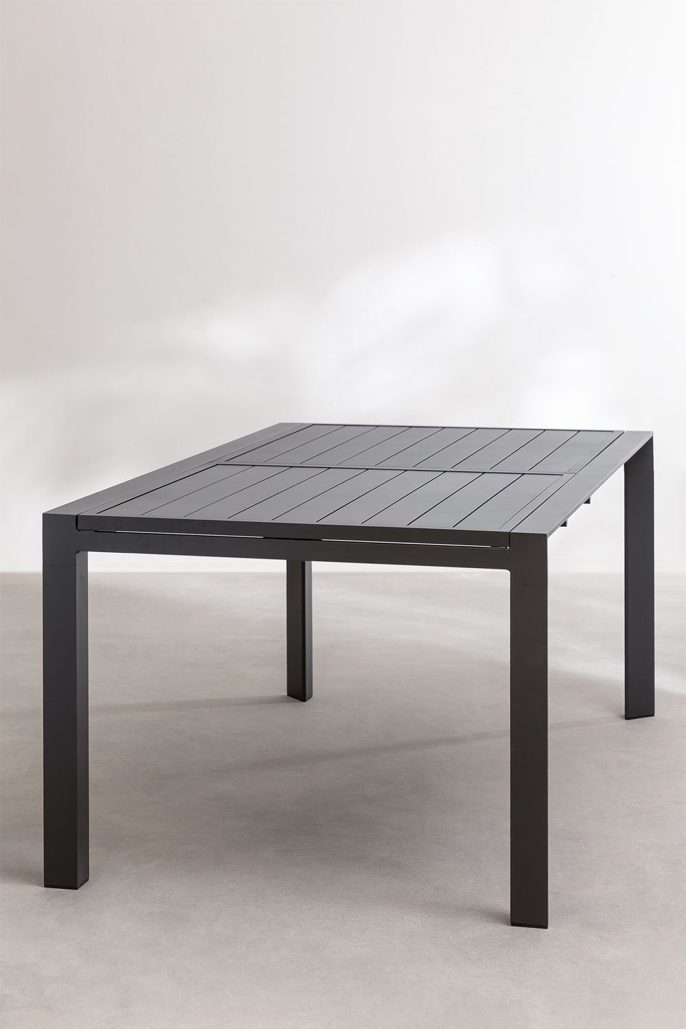 Set tavolo rettangolare 180-240x100 cm allungabile Starmi e 4 sedie da giardino impilabili in alluminio Archer