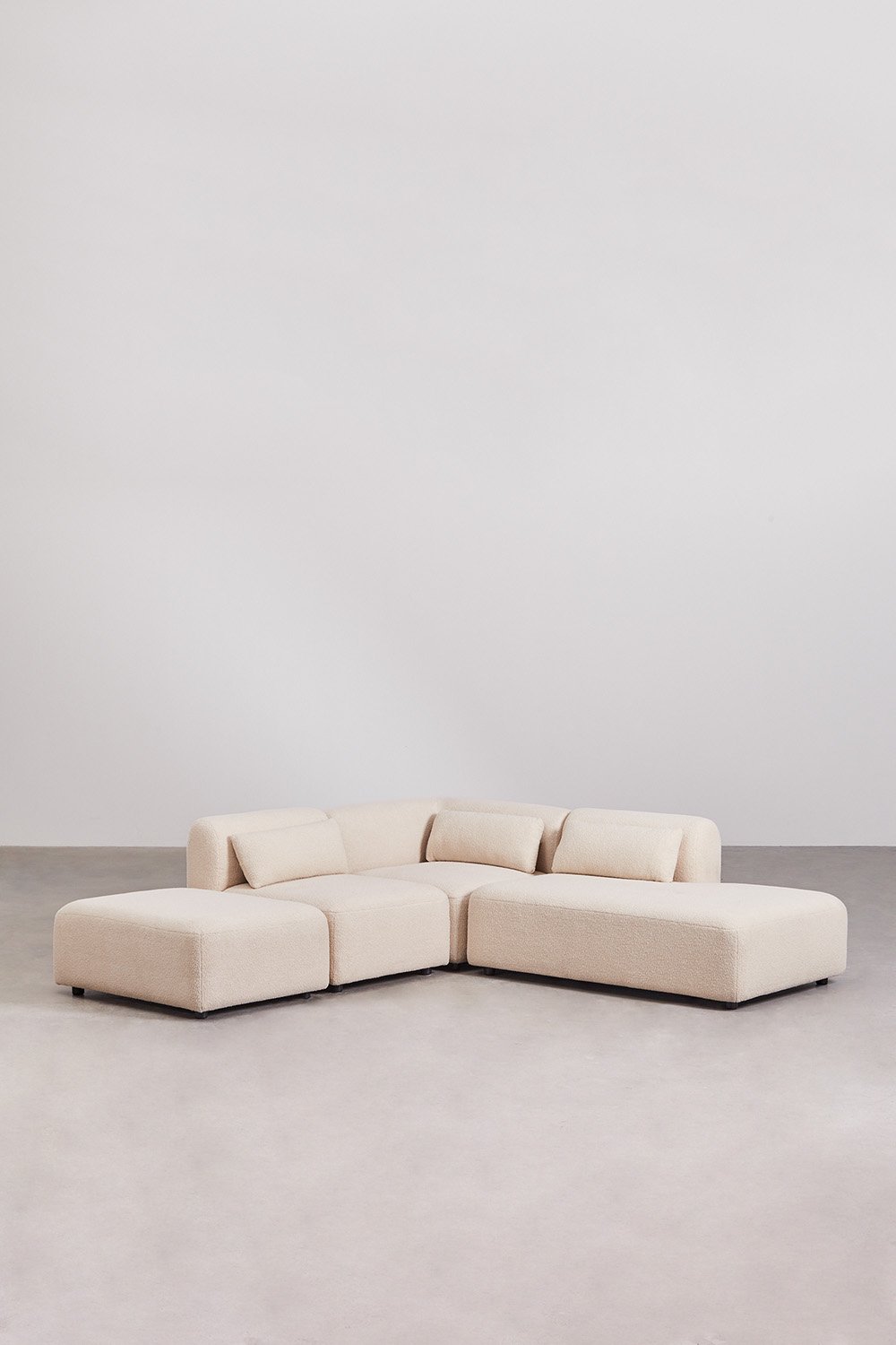 Divano angolare componibile in 3 pezzi con chaise longue destra e pouf Fogler