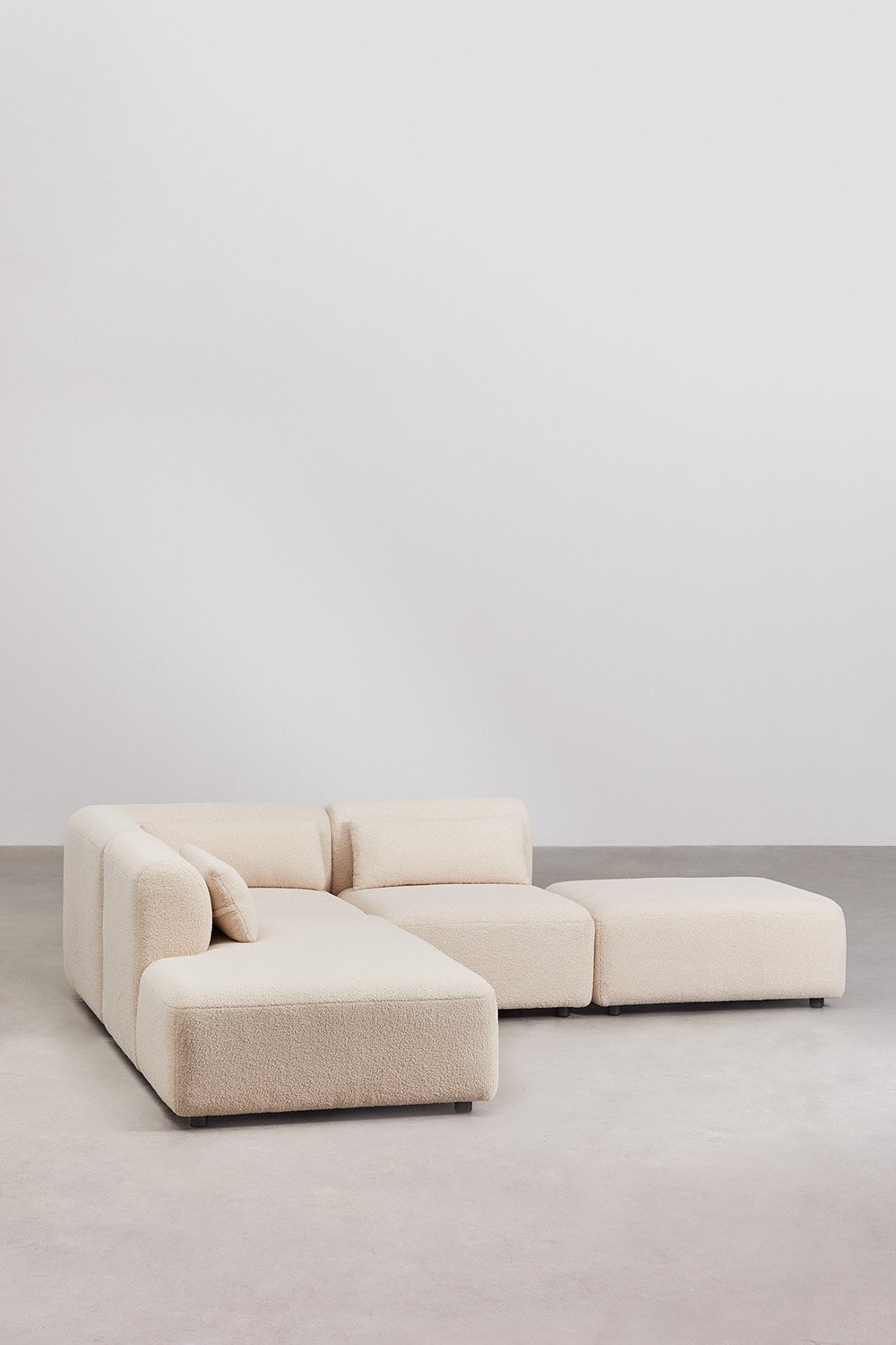 Divano angolare componibile in 3 pezzi con chaise longue sinistra e pouf Fogler
