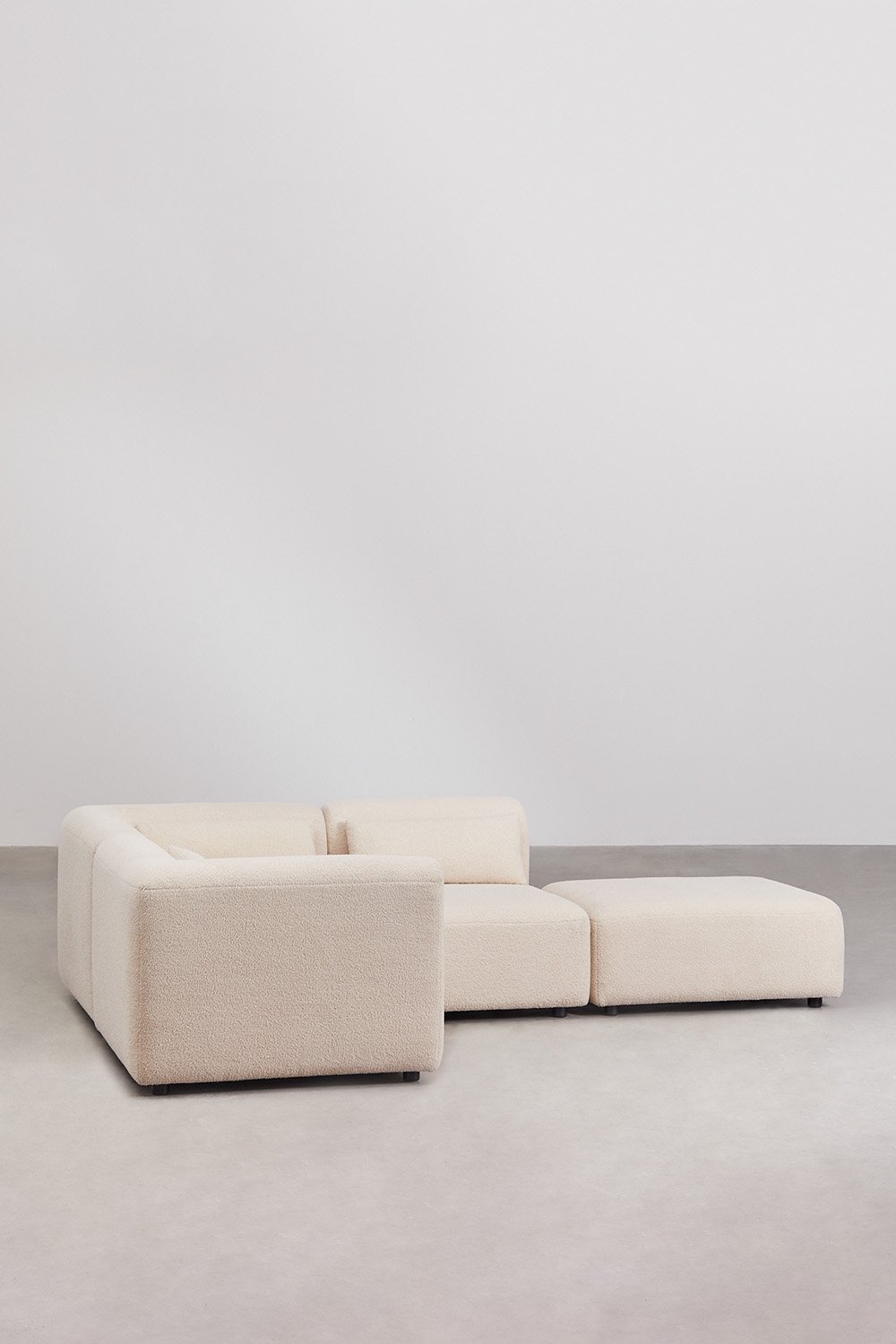 Divano angolare componibile in 3 pezzi con pouf Fogler
