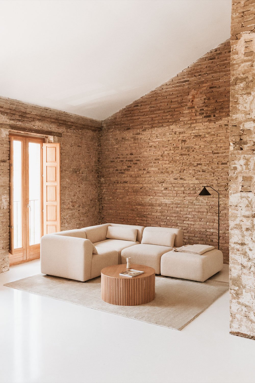 Divano angolare componibile in 3 pezzi con pouf Fogler