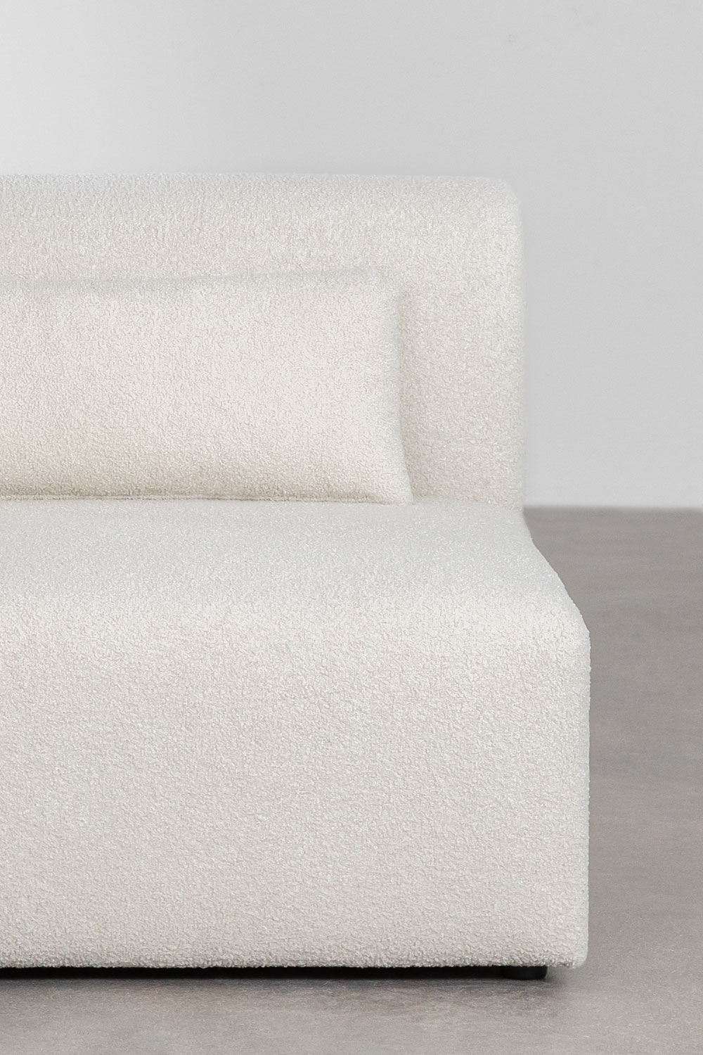 Divano componibile angolare destro in 2 pezzi con pouf triangolare in shearling Borjan