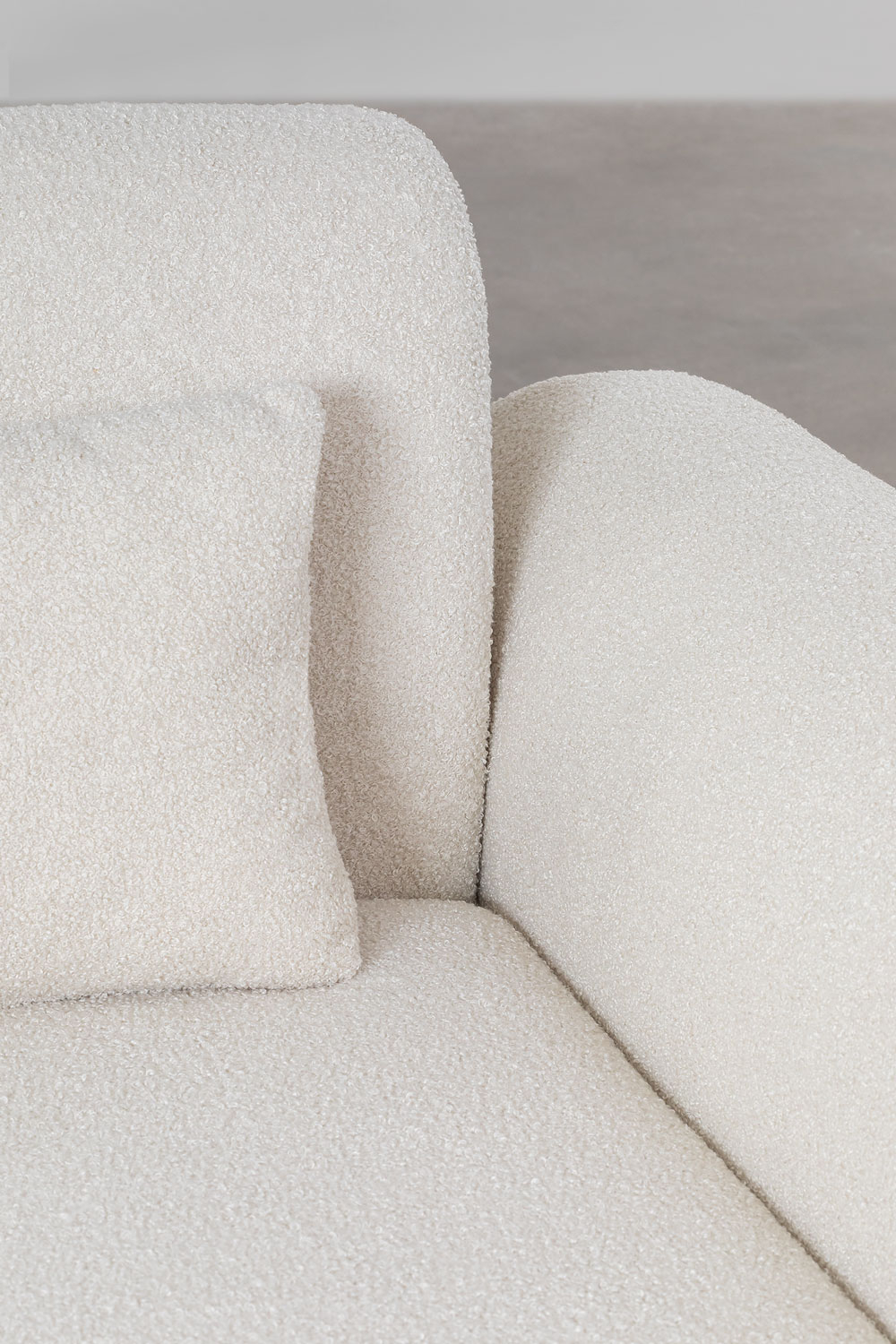 Divano componibile angolare destro in 3 pezzi con pouf triangolare in shearling Borjan