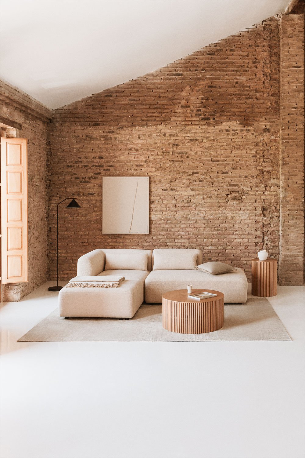 Divano componibile angolare in 2 pezzi con chaise longue destra e pouf Fogler