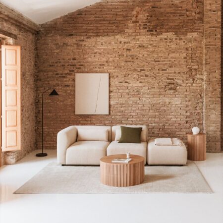 Divano componibile angolare in 2 pezzi con pouf Fogler