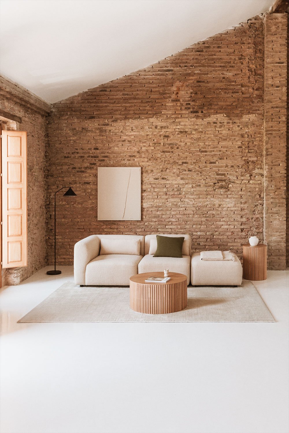 Divano componibile angolare in 2 pezzi con pouf Fogler