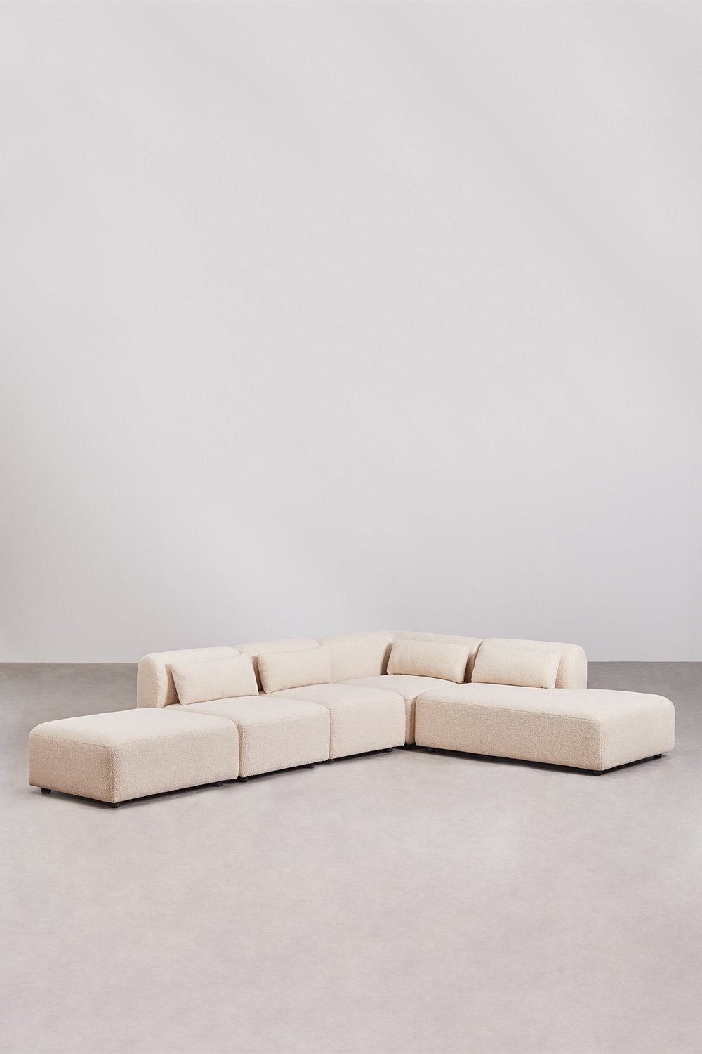 Divano componibile angolare in 4 pezzi con chaise longue destra e pouf Fogler