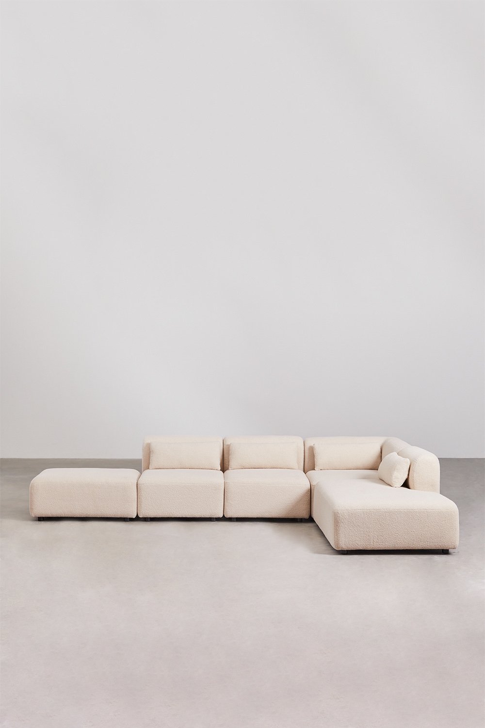 Divano componibile angolare in 4 pezzi con chaise longue destra e pouf Fogler