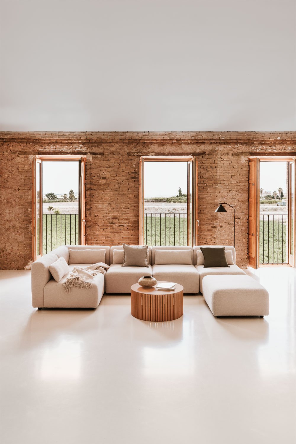 Divano componibile angolare in 5 pezzi con pouf Fogler