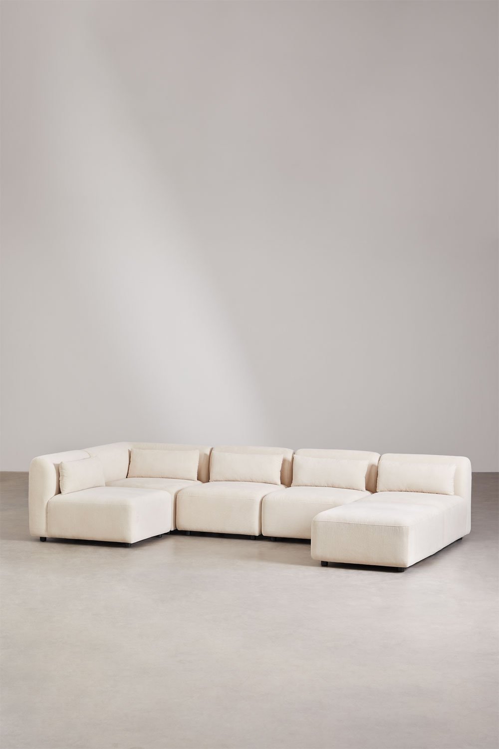 Divano componibile angolare in 5 pezzi con pouf Fogler