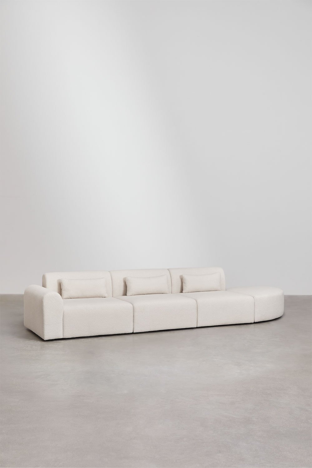 Divano componibile angolare sinistro in 3 pezzi con pouf triangolare in shearling Borjan