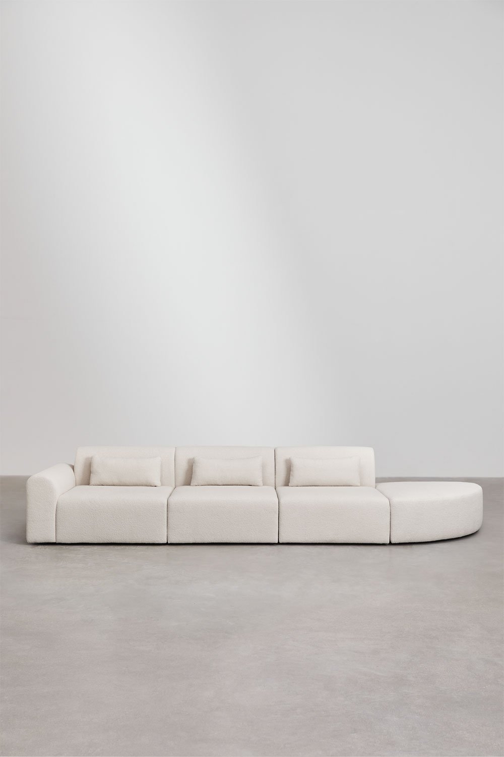 Divano componibile angolare sinistro in 3 pezzi con pouf triangolare in shearling Borjan
