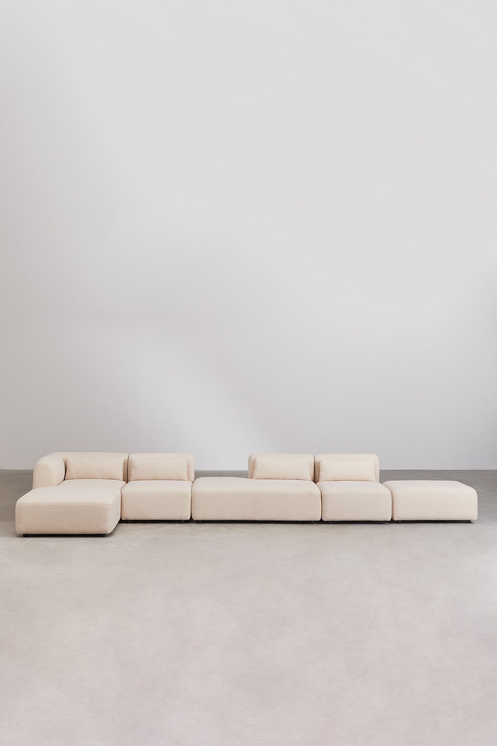 Divano componibile chaise longue angolare sinistro in 4 pezzi con chaise e puff Fogler