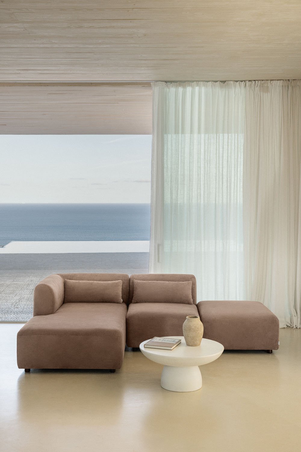 Divano componibile chaise longue sinistra in 2 pezzi con pouf Fogler