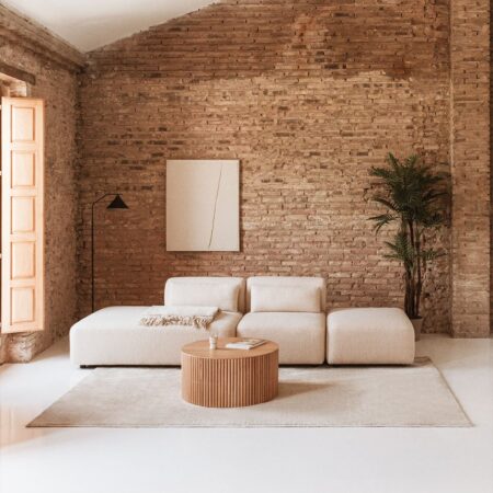 Divano componibile in 2 pezzi con chaise longue sinistra e pouf Fogler
