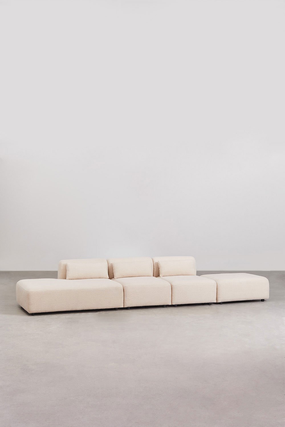 Divano componibile in 3 pezzi con chaise longue sinistra e pouf Fogler