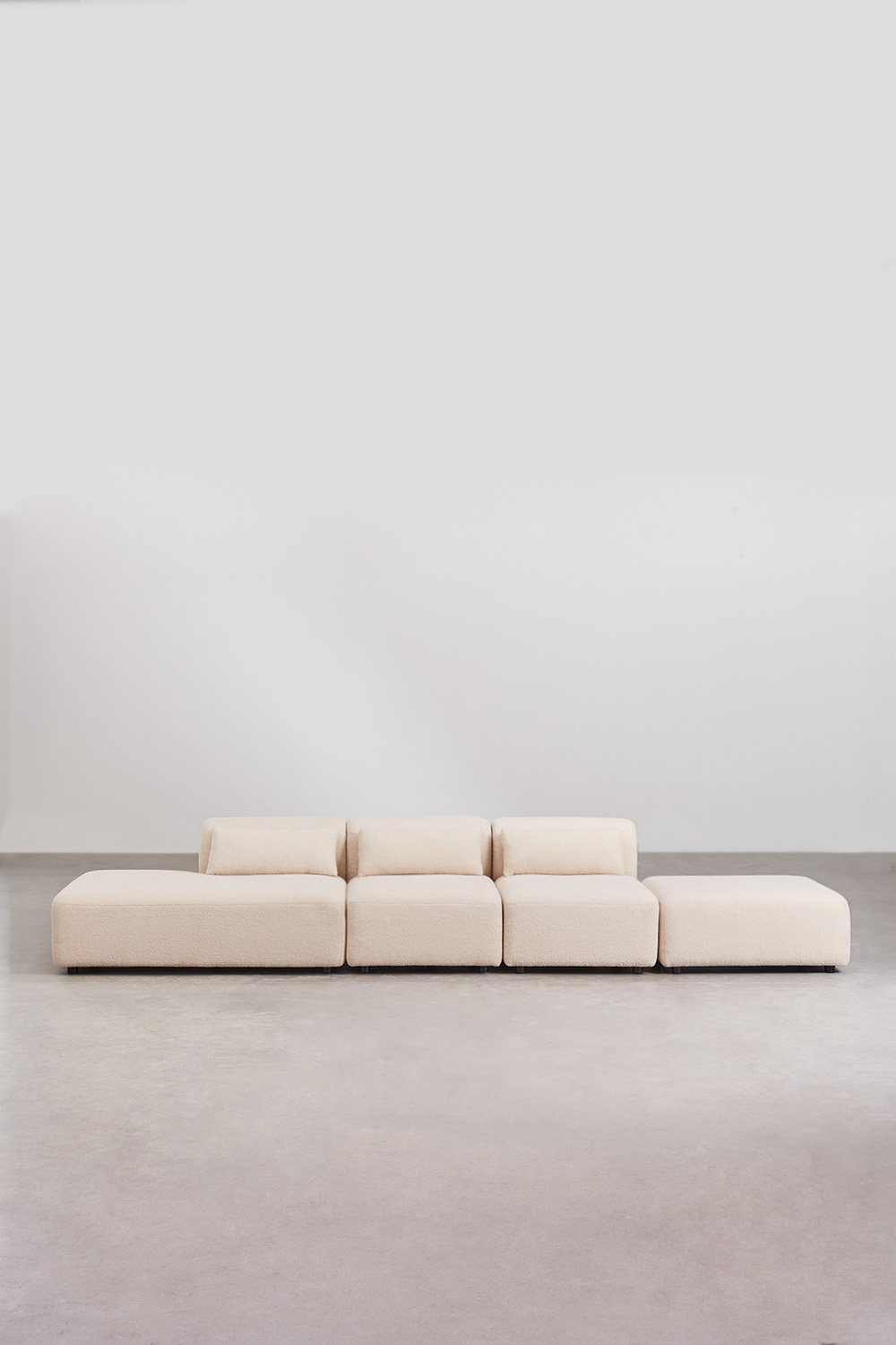 Divano componibile in 3 pezzi con chaise longue sinistra e pouf Fogler