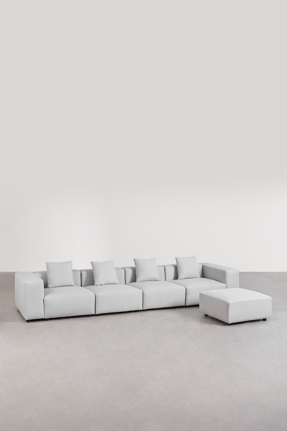Sofà modulare a 4 pezzi con bracciolo alto e pouf (↔︎400 cm) Bruna
