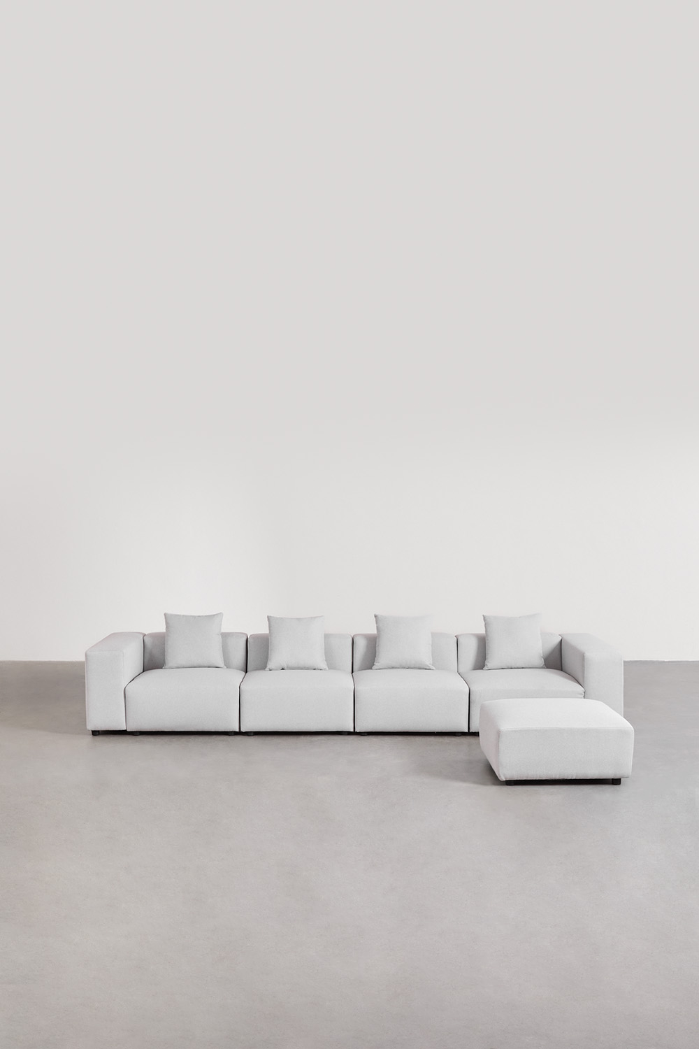 Sofà modulare a 4 pezzi con bracciolo alto e pouf (↔︎400 cm) Bruna