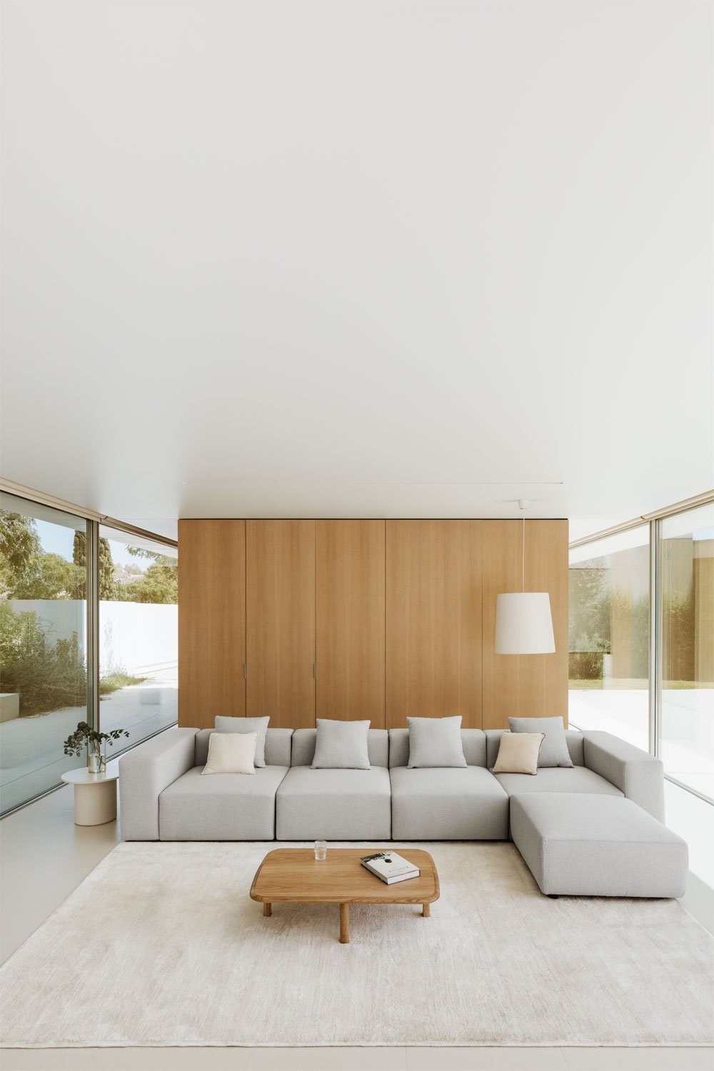 Sofà modulare a 4 pezzi con bracciolo alto e pouf (↔︎400 cm) Bruna