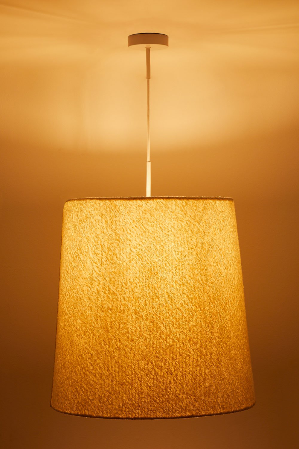 Lampada da soffitto in tessuto bouclé Delmore