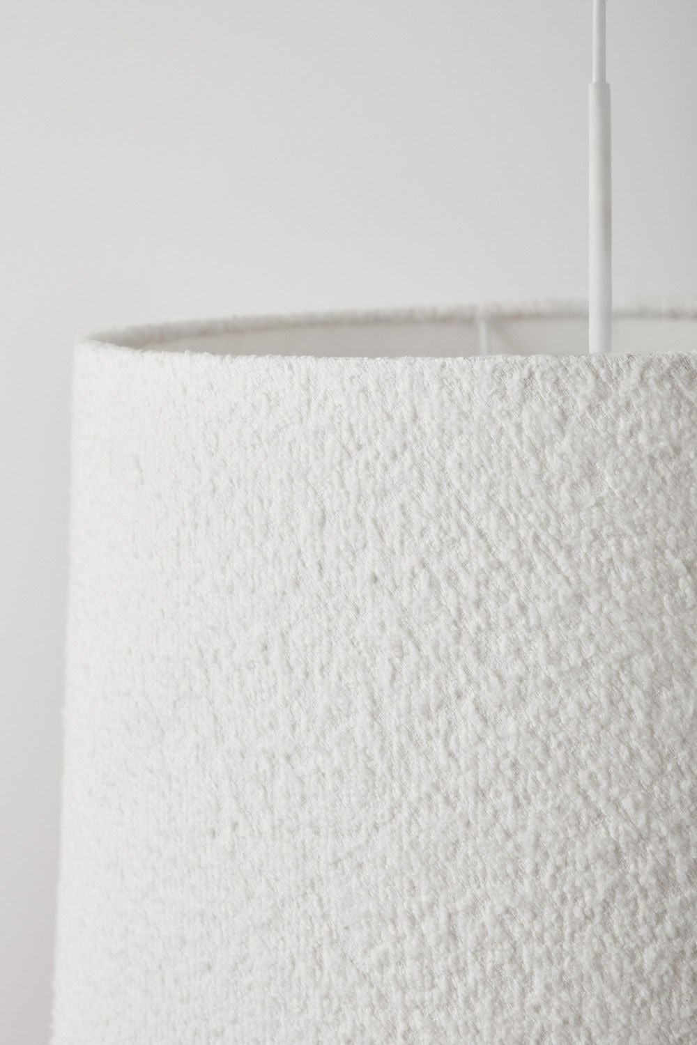 Lampada da soffitto in tessuto bouclé Delmore