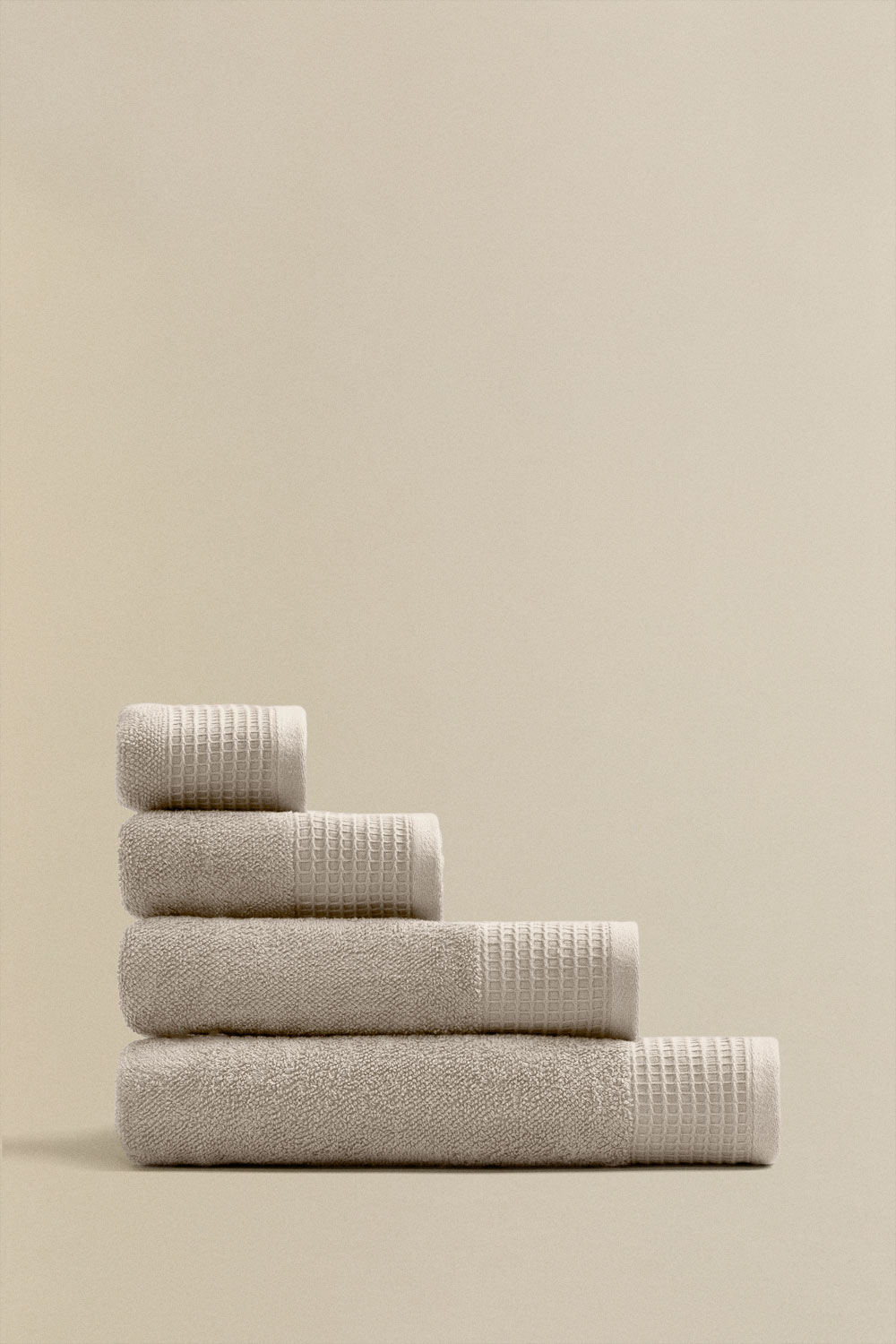 Set 4 asciugamani in spugna di cotone con bordo Claritone